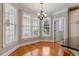 Charming breakfast nook with hardwood floors and large windows at 803 Landuff Ct, Cary, NC 27519