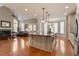 Bright kitchen with large island and open living area, ideal for entertaining guests at 803 Landuff Ct, Cary, NC 27519