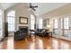 Bright living room with hardwood floors, fireplace, and vaulted ceilings at 803 Landuff Ct, Cary, NC 27519