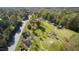 An aerial view of a community park with walking paths and green spaces at 803 Landuff Ct, Cary, NC 27519
