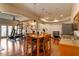 Multi-purpose recreation room with a dining area, exercise equipment, and wet bar, providing ample entertainment options at 803 Landuff Ct, Cary, NC 27519