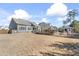 This home's large backyard contains a beautiful in-ground pool and a patio area that is surrounded by a privacy fence at 929 Mountain Vista Ln, Cary, NC 27519