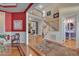 Spacious foyer with hardwood floors, an open staircase, and access to various living areas at 100 Watkins Farm Rd, Rolesville, NC 27571