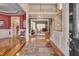 Grand foyer featuring hardwood floors, an open staircase, and views into the formal living spaces at 100 Watkins Farm Rd, Rolesville, NC 27571