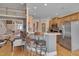 Kitchen with an open floor plan, stainless steel appliances and a breakfast bar at 100 Watkins Farm Rd, Rolesville, NC 27571