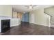 Open-concept living area with fireplace and hardwood floors at 1009 Laceflower Dr, Durham, NC 27713