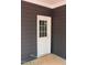 Close up of the home's back door showing the color scheme and construction details at 105 Sherwood Ln, Hillsborough, NC 27278