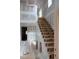 Interior view of an unfinished staircase leading to the second floor, showing the home's construction details at 105 Sherwood Ln, Hillsborough, NC 27278