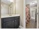 Bright bathroom featuring a sleek vanity, modern fixtures, and a neutral color palette at 109 Hammermill Dr, Fuquay Varina, NC 27526