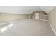 Unfurnished carpeted bonus room featuring neutral tones and ample space at 109 Hammermill Dr, Fuquay Varina, NC 27526