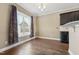 Bright breakfast area features hardwood floors, natural light, and space for dining at 109 Hammermill Dr, Fuquay Varina, NC 27526