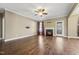 Open living room design with hardwood floors and fireplace at 109 Hammermill Dr, Fuquay Varina, NC 27526
