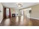Open living room concept with hardwood floors, fireplace and easy access to kitchen at 109 Hammermill Dr, Fuquay Varina, NC 27526