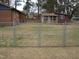 Fenced backyard and covered porch at 110 N 8Th St, Erwin, NC 28339