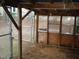 View of the partially enclosed, wooden structure in the backyard at 110 N 8Th St, Erwin, NC 28339