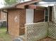 Brick home with an exterior white door and outdoor ramp at 110 N 8Th St, Erwin, NC 28339