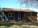 Charming single-story home featuring a brick facade and well-maintained front yard at 110 N 8Th St, Erwin, NC 28339