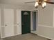 Interior view showcasing neutral paint, updated fixtures, and carpet flooring at 110 N 8Th St, Erwin, NC 28339