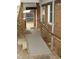 Wheelchair access ramp and handrail lead to back door of this brick home at 110 N 8Th St, Erwin, NC 28339