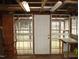 Shed interior featuring bright overhead lights and multiple windows for ample light at 110 N 8Th St, Erwin, NC 28339