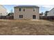Two story back exterior with siding and fenced yard at 1113 Crendall Way, Wake Forest, NC 27587