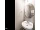 Stylish half bathroom featuring modern fixtures and a sleek design at 1113 Crendall Way, Wake Forest, NC 27587