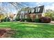 Charming brick home with a well-maintained lawn and inviting curb appeal at 1154 Smith Creek Way, Wake Forest, NC 27587