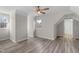 Bright bedroom with wood floors and multiple windows at 1309 N Holland Rd, Fuquay Varina, NC 27526