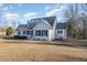 Charming one-story home with classic curb appeal, a covered porch, and well-maintained landscaping at 1309 N Holland Rd, Fuquay Varina, NC 27526