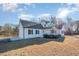 Charming one-story home with classic curb appeal, a covered porch, and well-maintained landscaping at 1309 N Holland Rd, Fuquay Varina, NC 27526