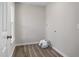 Laundry room features natural light from a window, outlets, and washer/dryer hookups at 1309 N Holland Rd, Fuquay Varina, NC 27526