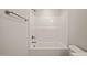 Clean white bathroom featuring a shower and tub combination at 140 Pilot Ridge Rd, Zebulon, NC 27597