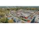 Beautiful aerial view of mixed-use buildings with parking and the Charlotte skyline at 1406 Lyon St # 101, Raleigh, NC 27608