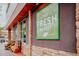 Exterior shot of The Fresh Market, with a green branded sign and stone accents at 1406 Lyon St # 101, Raleigh, NC 27608