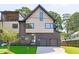 Beautiful, modern home with a well-kept lawn and a contemporary design at 1406 Lyon St # 101, Raleigh, NC 27608