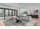 Spacious living room showcasing modern decor, hardwood floors, and a comfortable seating area at 1406 Lyon St # 101, Raleigh, NC 27608