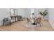 Living room featuring hardwood floors, unique wicker chairs, and stylish decor at 1406 Lyon St # 101, Raleigh, NC 27608