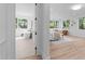 Bright main bedroom suite with soaking tub and oversized windows at 1406 Lyon St # 101, Raleigh, NC 27608