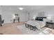 Spacious main bedroom features natural light, wood floors and walk in closet at 1406 Lyon St # 101, Raleigh, NC 27608
