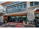 Charming exterior shot of Cameron Spa & Nails, with stone accents and awning at 1406 Lyon St # 101, Raleigh, NC 27608