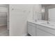 Bathroom featuring double vanity and updated fixtures at 160 Scenic Rock Dr, Youngsville, NC 27596