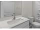 Clean bathroom featuring a white vanity, undermount sink, and modern fixtures at 160 Scenic Rock Dr, Youngsville, NC 27596