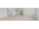 Carpeted bedroom with attached closet and bathroom at 160 Scenic Rock Dr, Youngsville, NC 27596