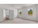Large bedroom with two windows and an attached bathroom at 160 Scenic Rock Dr, Youngsville, NC 27596
