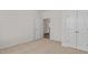 Empty bedroom with neutral carpet flooring and double door closet at 160 Scenic Rock Dr, Youngsville, NC 27596