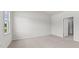 Spacious bedroom offers a large window and neutral walls at 160 Scenic Rock Dr, Youngsville, NC 27596