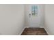 Welcoming foyer with decorative glass door and wood flooring at 160 Scenic Rock Dr, Youngsville, NC 27596