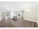 Open floor plan featuring kitchen with island, granite countertops and stainless steel appliances at 1985 Meadowview Dr, Graham, NC 27253