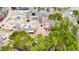 Aerial perspective showing location in the community surrounded by trees at 2104 Live Oak Dr, Sanford, NC 27330