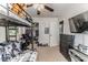 A bedroom with a bunk bed, a ceiling fan, a closet and two windows at 2104 Live Oak Dr, Sanford, NC 27330